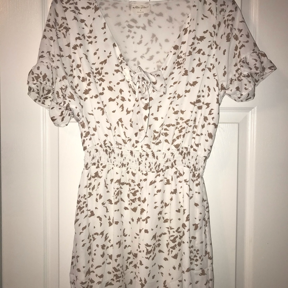 White and tan speckled romper